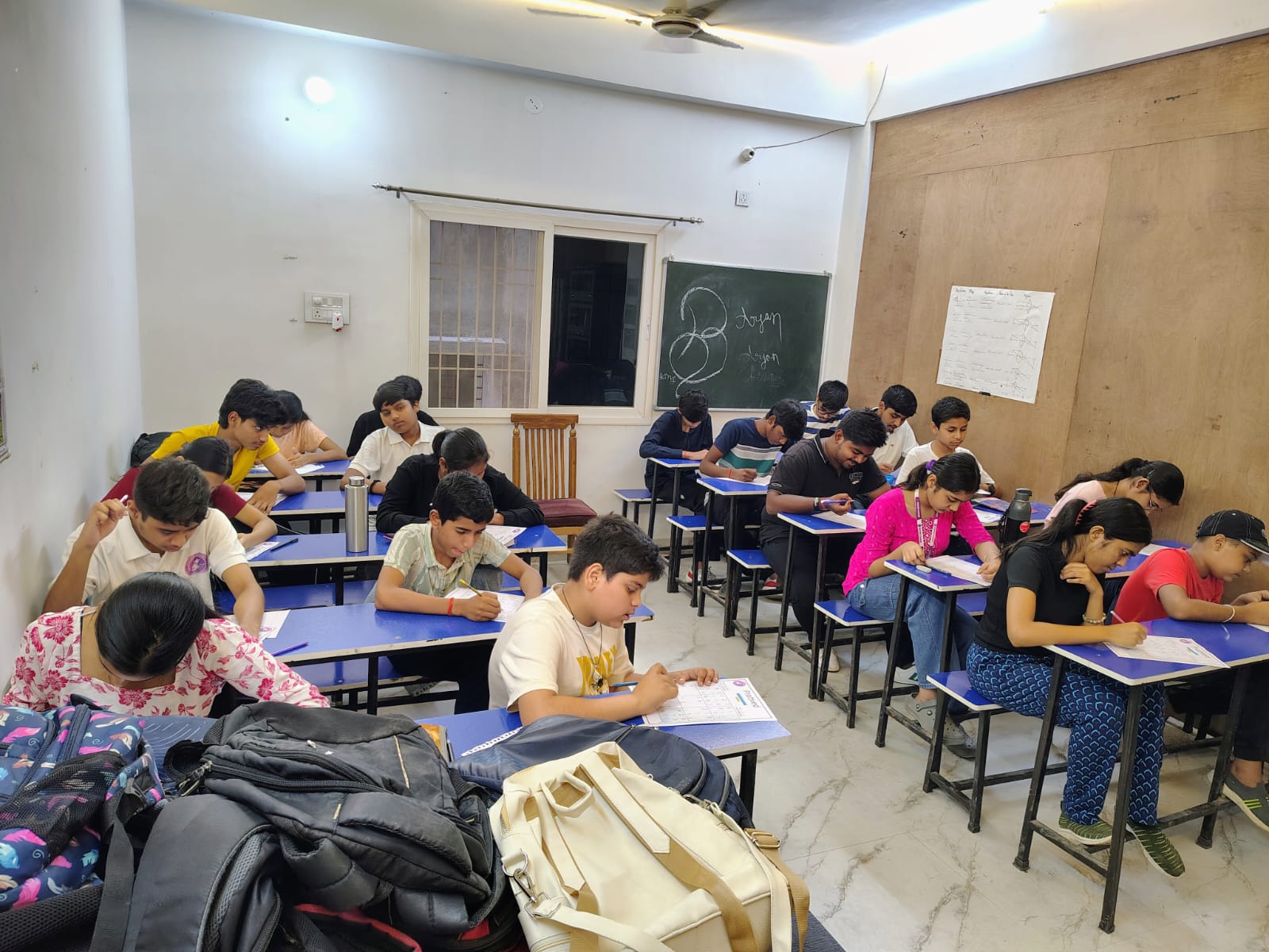 Students working through a test in a Pratived Classes classroom